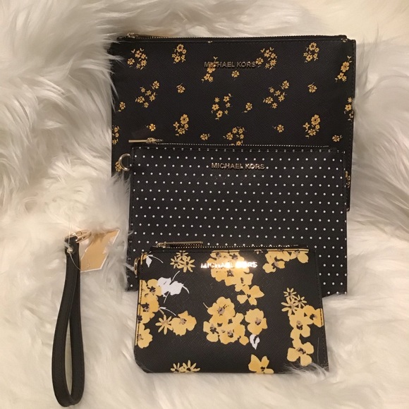Michael Kors 4 pc clutch set